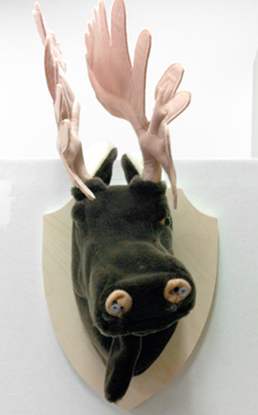 Animatronic plush taxidermy moose head.